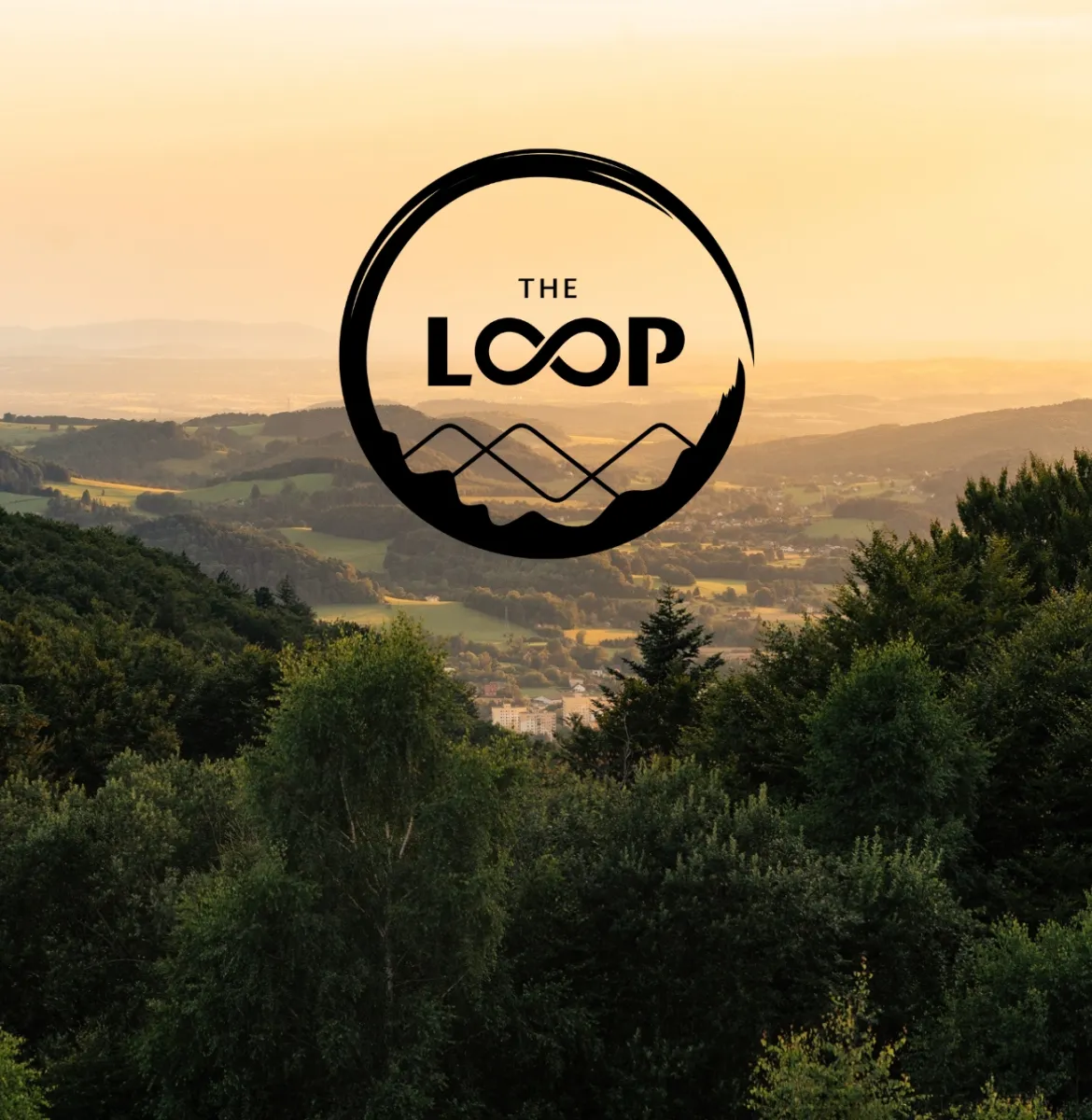 Logo the Loop na tle gór
